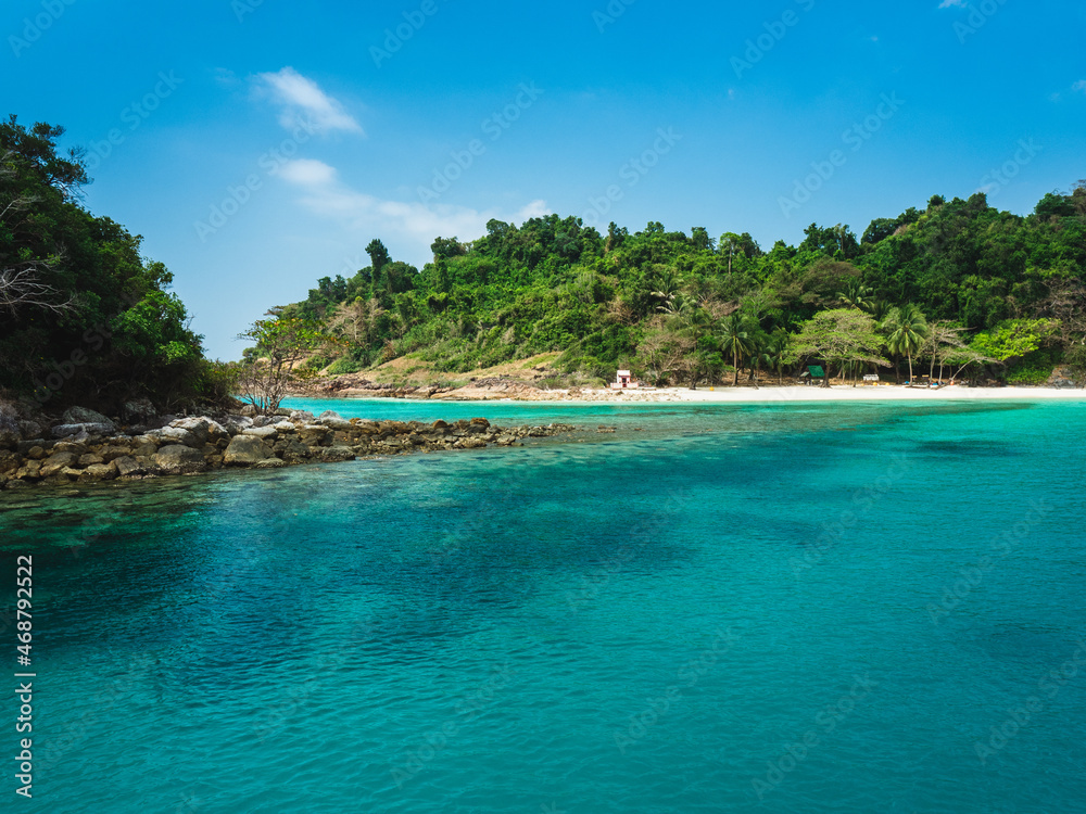 Ko Rang Island. Scenic rocky island, clear turquoise seawater and coral reef. Beautiful snorkeling spot in Mu Koh Chang National Park, Trat, Thailand.