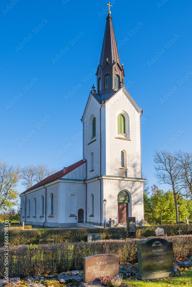 Swedish old country church with a cemetery