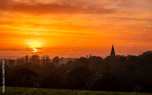 Autumn November sunset over the high weald and skyline of Old Heathfield in East Sussex, south east England UK.