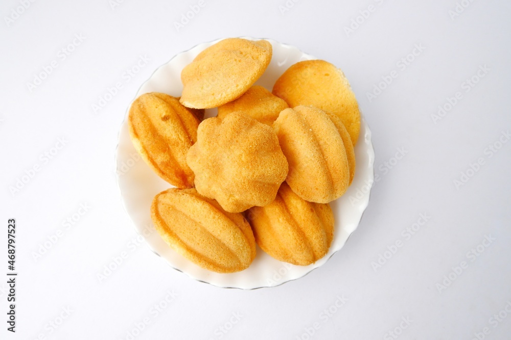 madeleine cake isolated on white background madeleine cake isolated on white background
