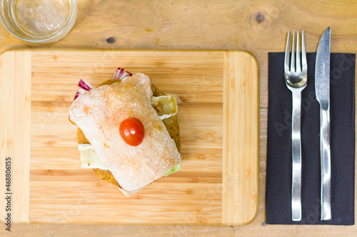 sliced ham on a wooden board