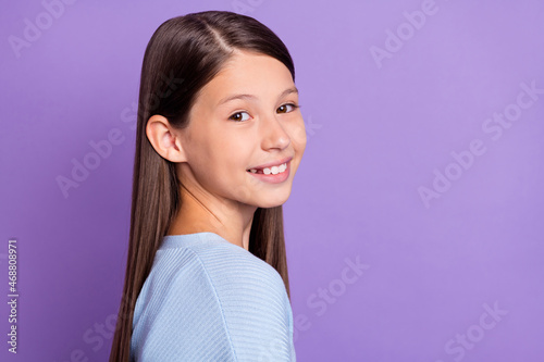 Profile photo of funky brunette student little girl wear blue shirt isolated on violet color background