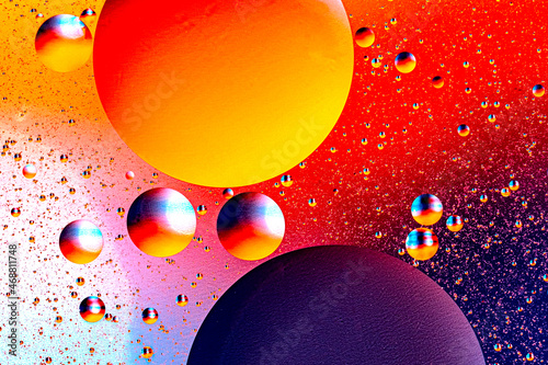 Abstract colorful background of oil circles. Oil in the water surface circles  water foam and oil bubbles.