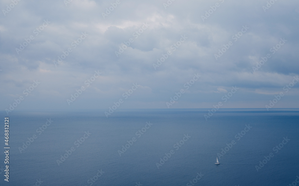 Ship floating on sea. Fishermans in boat. small boat on background of calm and quiet blue ocean water