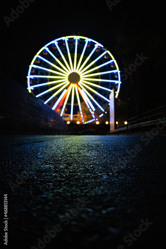 Colorful fun park wheel in Athens, Greece