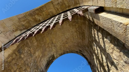 Historic site of Besalú in La Garrocha Girona medieval town pon fortified wall bridge over the river, point of tourist interest