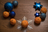 Beautiful Christmas background with tangerines and space for text