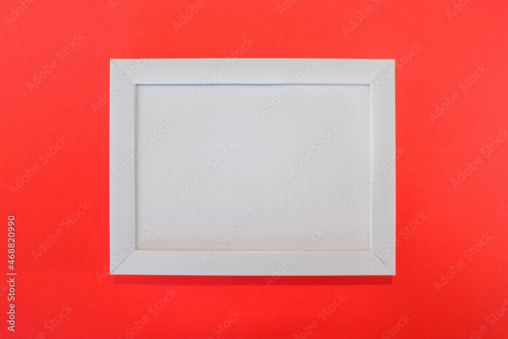 blank white frame and picture isolated on red background. blank white frame and picture isolated on red background.