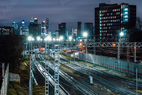 view from a bridge over the road to the road and Moscow City  night city landscape. High quality photo