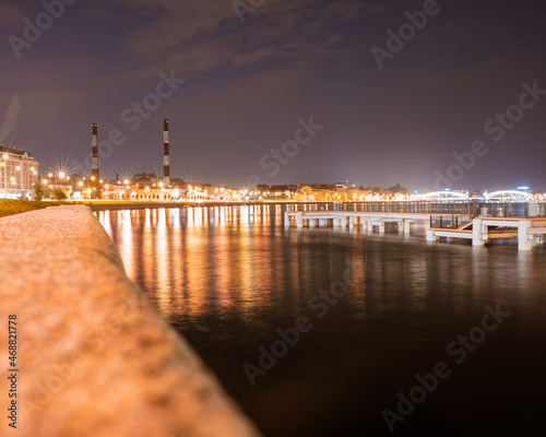 Evening lights in the city on the river
