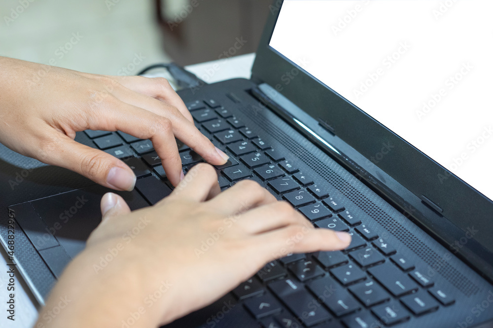 Latin girl with curly hair working from the comfort of her home on her laptop Latin girl with curly hair working from the comfort of her home on her laptop