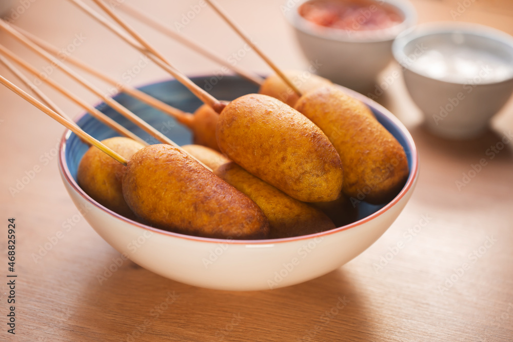 Corn dogs cooked with sausage and dough - obrazy, fototapety, plakaty 
