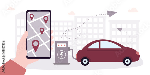 Eco transport. Hand holding mobile phone with application for finding points for charge eco car. Electric vehicle charging at station. Electrified future transportation