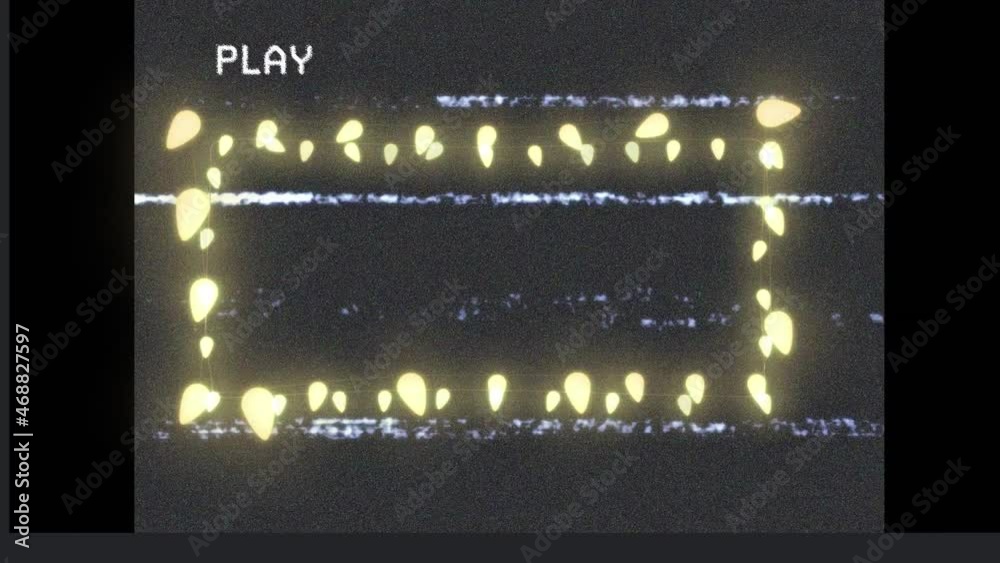 Animation of frame of glowing yellow christmas fairy lights on playback screen, with interference Animation of frame of glowing yellow christmas fairy lights on playback screen, with interference