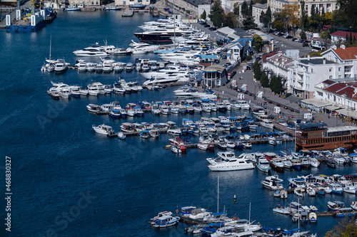 Balaklava Bay in the Crimea. white boats and yachts at the pier. Seaside town