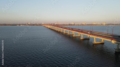 Wallpaper Mural Cars and buses travel along the road on long bridge over the river, bay. drone view, aerial photography. Bridge over the Dnieper, urban transport in city Dnipro, Dnepropetrovsk, Ukraine Torontodigital.ca