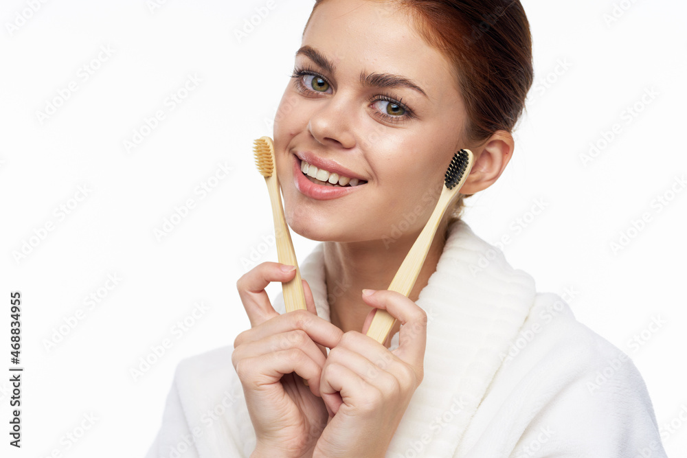 contact woman in white robe toothbrushes bathroom hygiene contact woman in white robe toothbrushes bathroom hygiene