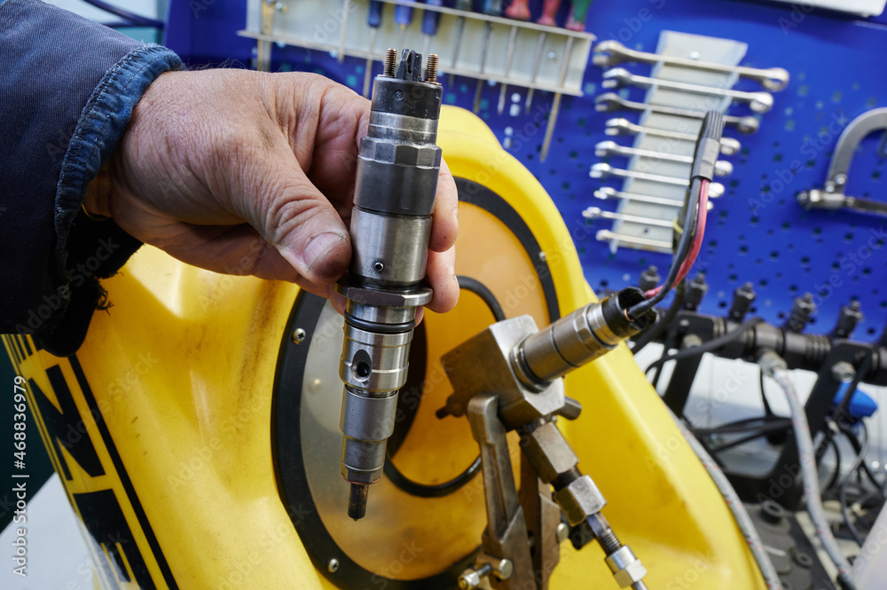 At the stand, the process of checking the operability and wear, the operational properties of the nozzle of a diesel internal combustion engine, At the stand, the process of checking the operability and wear, the operational properties of the nozzle of a diesel internal combustion engine,