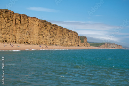 West Bay beach and cliffs - Dorset, England, UK photo