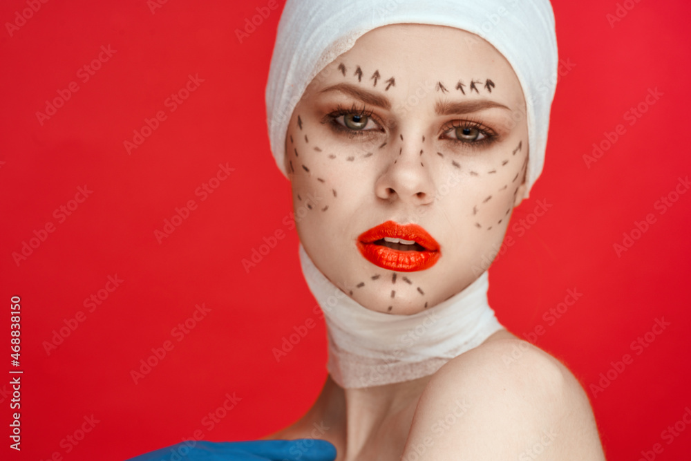 portrait of a woman posing in blue gloves red lips surgery facial rejuvenation studio lifestyle portrait of a woman posing in blue gloves red lips surgery facial rejuvenation studio lifestyle