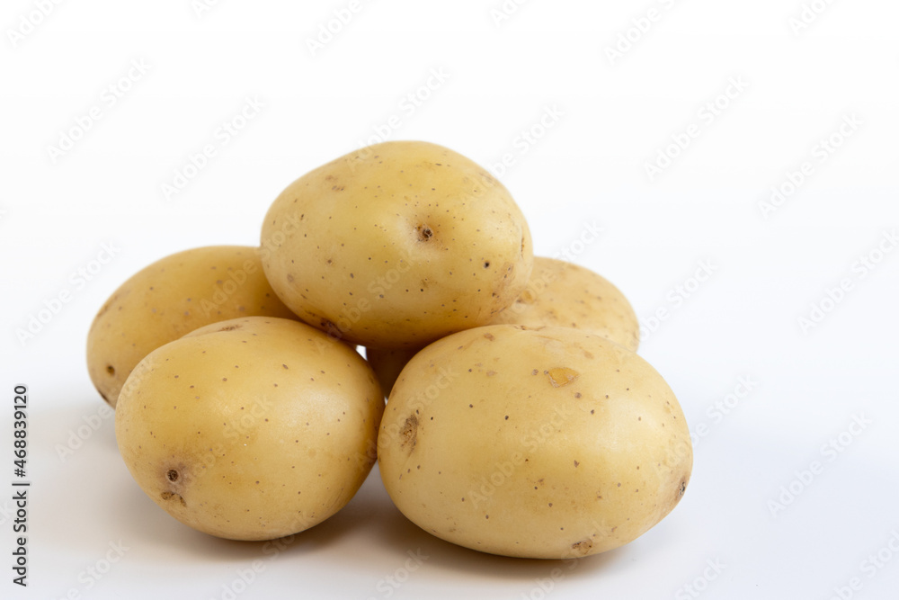 pile of potatoes isolated on white background pile of potatoes isolated on white background