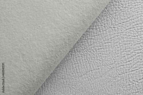 white artificial leather with waves and folds on PVC base