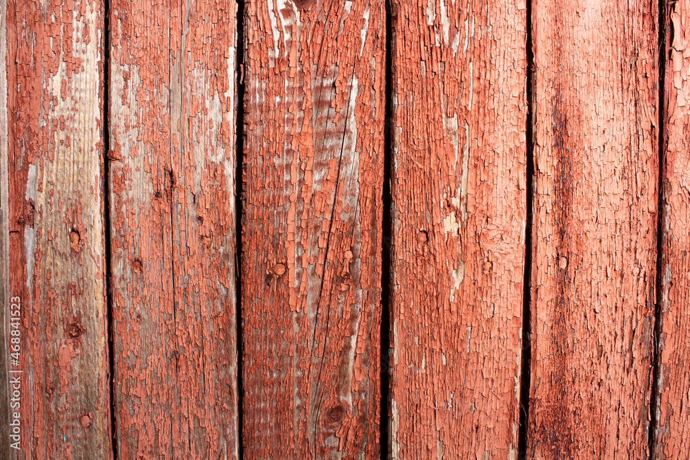 Texture of old wooden planks. Remains of old paint on the painted wood surface.