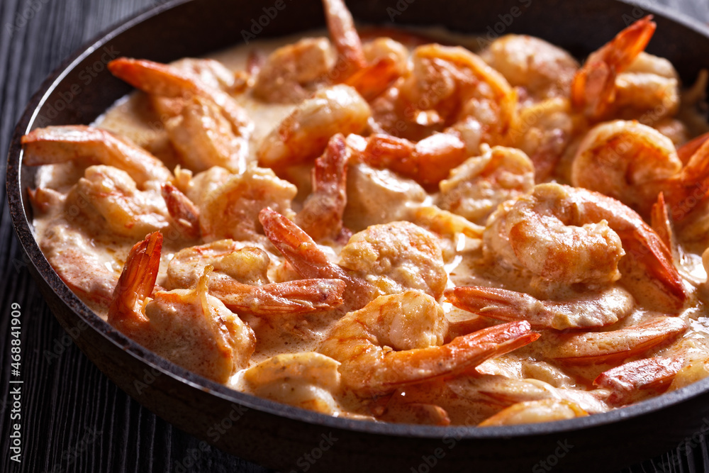 prawns cooked in rich, creamy Alfredo sauce prawns cooked in rich, creamy Alfredo sauce