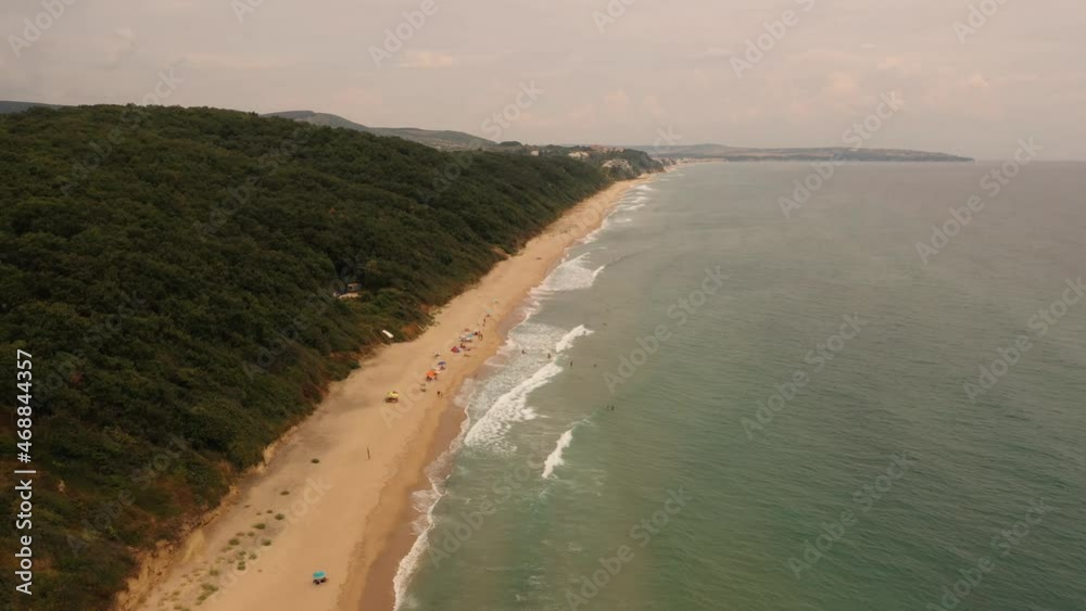 custom made wallpaper toronto digitalaerial drone top view over ocean Black sea sand beach rocky mountains cliffs dense forest bright sunny day. flying low above waves curling on shore 4k Bulgaria Europe. summer warm weather temperature