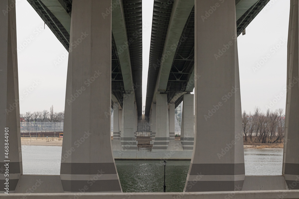 Fototapeta premium Bridge over the river bottom view