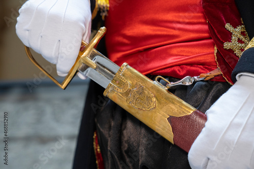 Pull the sword out of its scabbard
