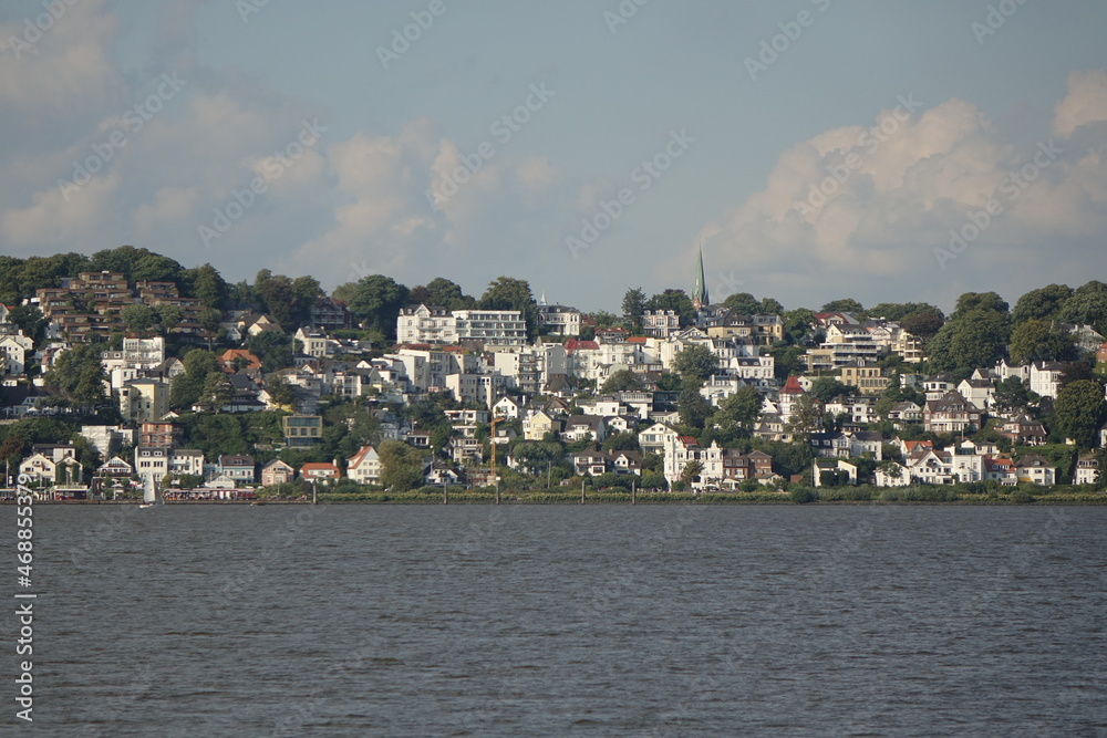 Hamburg's wealthy suburb Blankenese with its white houses seen from the River Elbe, Blankenese, Hamburg, Germany
