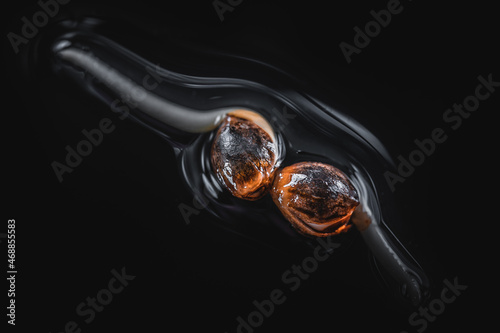 Foto Medical Cannabis Seeds on the Black Background in Drop of Water - THC CBD, Germination of Cannabis Seeds, Sprouting