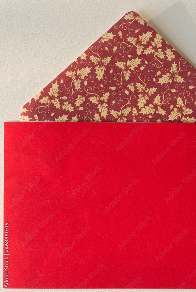 red paper with decorative envelope flap