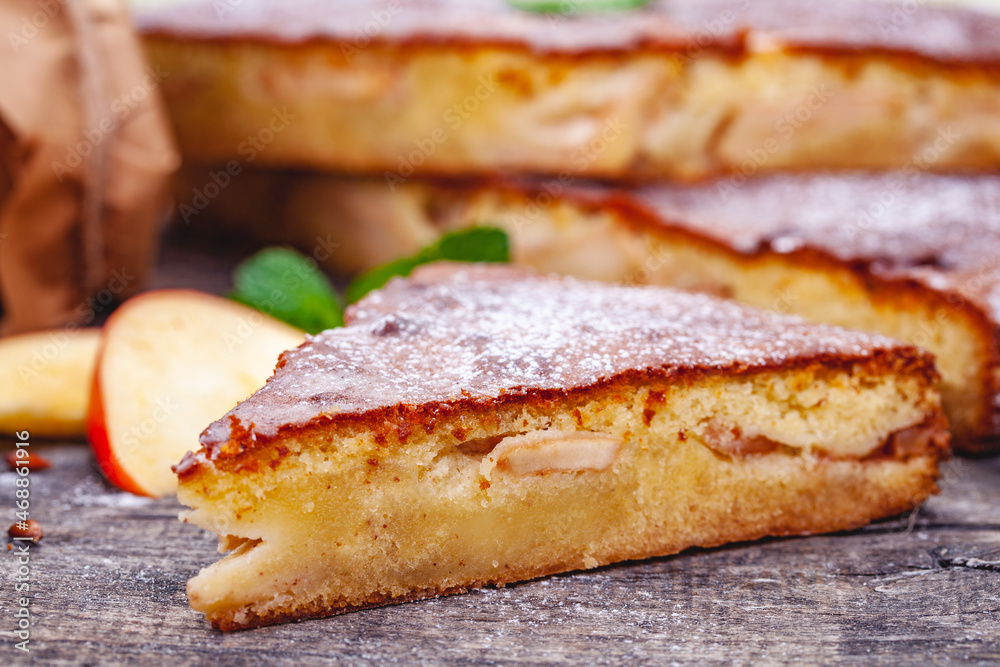 Pie with apple and pear on wooden rustic table. Close up Pie with apple and pear on wooden rustic table. Close up