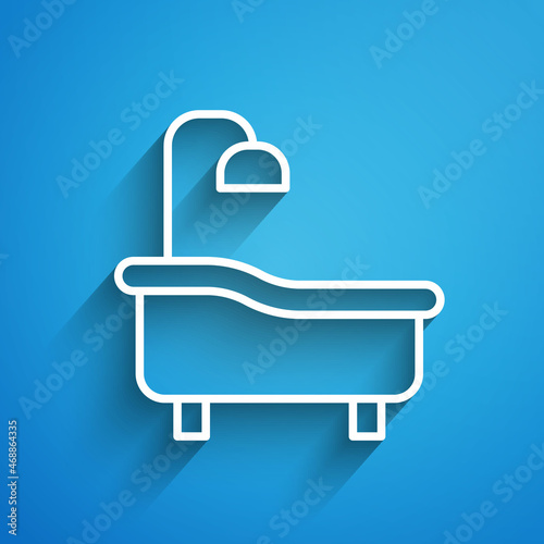 White line Bathtub icon isolated on blue background. Long shadow. Vector