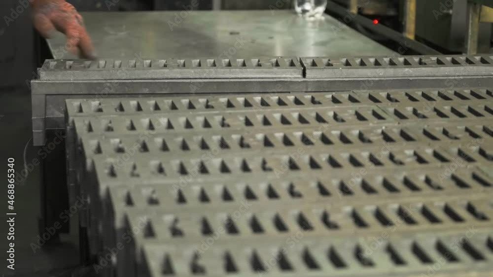 Production of sewer hatches and outflows from recycled plastic. Secondary raw materials. Recycling of waste for further utilization. Garbage workers sort material for recycling at a waste recycling