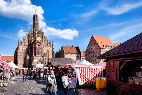 Nuremberg, Marketplace with cathedral and market stalls on a sunny day in Autumn © EKH-Pictures