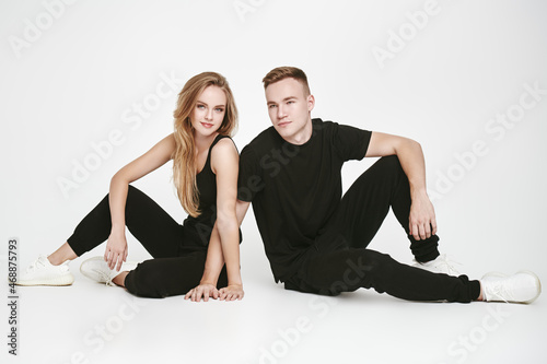 couple in black sportswear