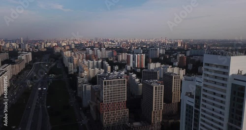 4K late afternoon summer aerial video of newly built modern highrise Moscow apartment buildings block complex in Kuntsevo district near Molodeznaya subway station and Rublevskoye highway in Russia photo