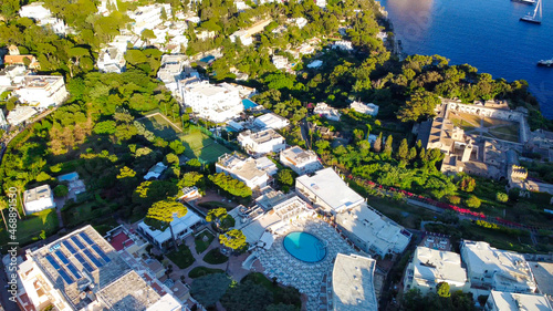 Aerial view of Capri homes and cityscape at summer sunset, Campania - Italy