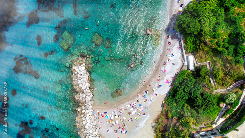 Beautiful coastline of Capri along the port area. Aerial view from drone.