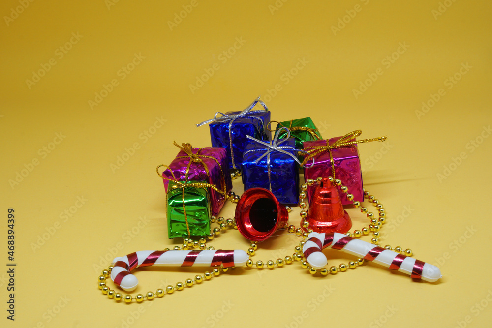 Many Gift Box arrange flat patterns - Xmas or Christmas  concept on yellow pastel background and copy space  