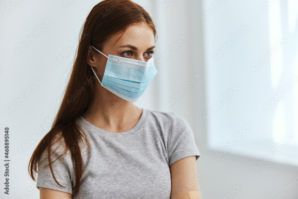 woman in medical mask protection against covid-19 virus woman in medical mask protection against covid-19 virus
