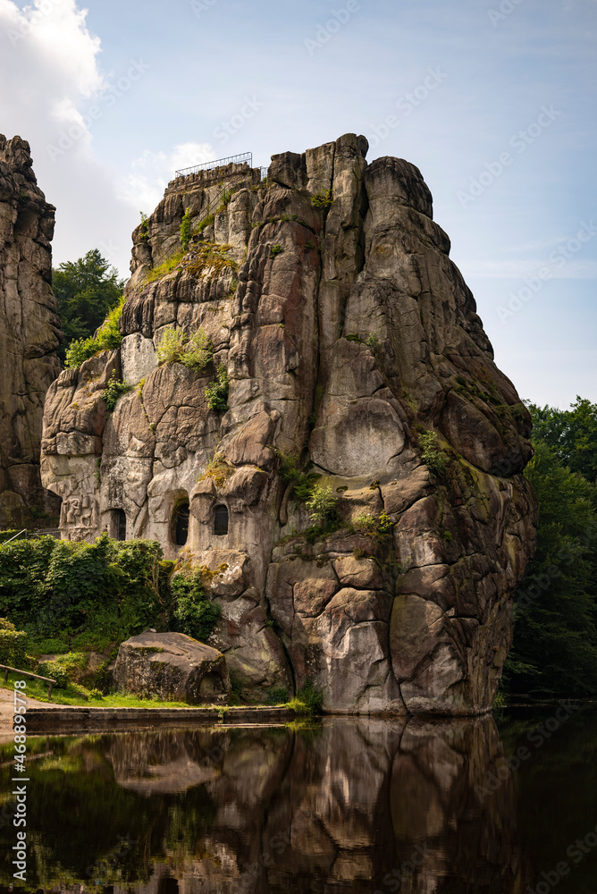 The Externsteine, a prominent sandstone rock formation in the Teutoburg Forest, near the town of Horn-Bad Meinberg in the district of Lippe in North Rhine-Westphalia (Germany). The Externsteine, a prominent sandstone rock formation in the Teutoburg Forest, near the town of Horn-Bad Meinberg in the district of Lippe in North Rhine-Westphalia (Germany).