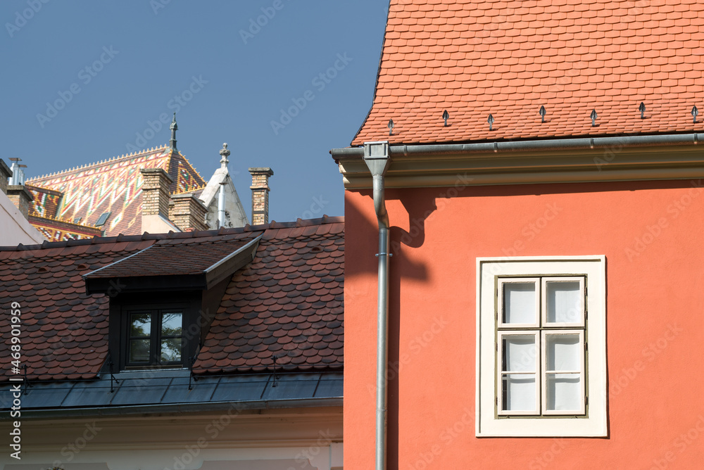 Window and roofs of old town