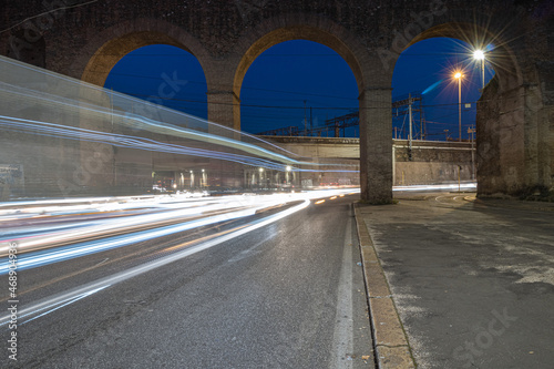 Canvas Print Cool long exposure cars traffic light trails, night view of the city of Rome