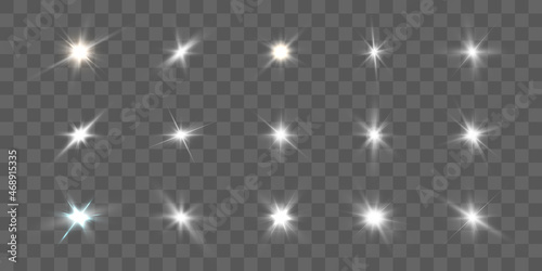 Realistic collection of bright light effects, sparkling stars on a transparent background. Vector photo