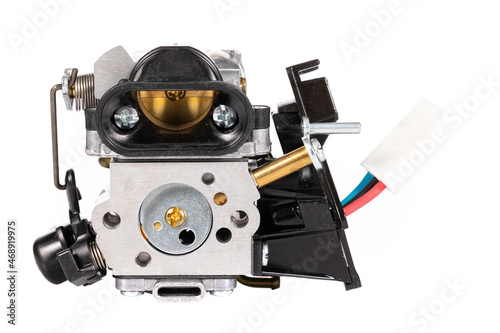 small carburetor on white background, new spare part for chainsaw