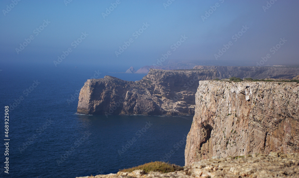 A cliff surrounded by waterscape
